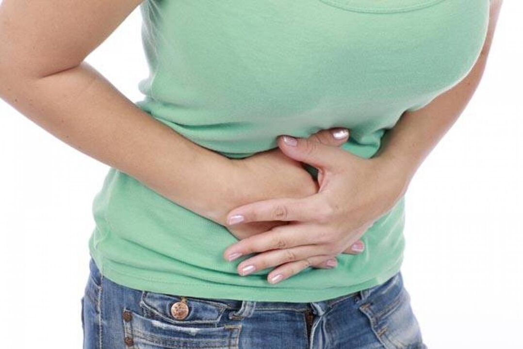 abdominal pain due to the presence of parasites in the body